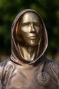 Portrait of the statue of Satoshi Nakamoto mysterious founder of Bitcoin