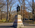 Portrait statue of William Shakespeare on a pedestal in Central Park, New York.