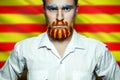 Portrait Of A Stern Man With A beard, Unraveled In Colors Of The Flag Of Catalonia. Referendum For The Separation Of Catalonia Fro