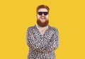 Portrait of strange funny cool chubby bearded man isolated on orange background. Royalty Free Stock Photo