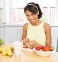 Portrait, strawberry and fruit salad with a woman in the kitchen of her home for health, diet or nutrition. Smile, food