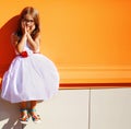 Portrait street fashion little girl in dress
