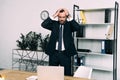 portrait of stressed businessman in suit standing at workplace Royalty Free Stock Photo