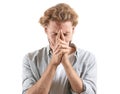 Portrait of stressed man on white background