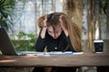 Portrait of a stressed out business woman at her workplace. She Royalty Free Stock Photo