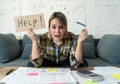 Portrait of stressed and overwhelmed young woman with too much credit card debts Royalty Free Stock Photo