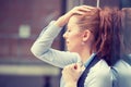 Portrait stressed sad young woman outdoors. Urban life style stress Royalty Free Stock Photo