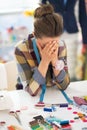 Portrait of stressed tailor woman at work Royalty Free Stock Photo