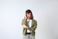 Portrait of stressed young girl on white background Royalty Free Stock Photo