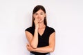 Portrait of stressed young woman biting nails Royalty Free Stock Photo