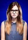 Portrait of strict young woman with nerd glasses Royalty Free Stock Photo