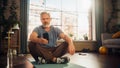 Portrait of a Strong Athletic Fit Senior Man Using Smartphone in Between Workouts During Morning Royalty Free Stock Photo