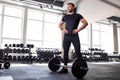 Portrait of strong bodybuilder athletic fitness man in gym Royalty Free Stock Photo