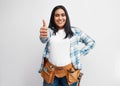 Portrait of a strong young Indian woman about to do DIY giving thumbs up