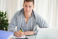Portrait of a student doing his homework Royalty Free Stock Photo