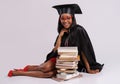 Portrait of student in graduation gown Royalty Free Stock Photo