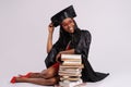 Portrait of student in graduation gown Royalty Free Stock Photo