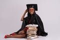 Portrait of student in graduation gown Royalty Free Stock Photo