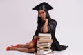 Portrait of student in graduation gown Royalty Free Stock Photo