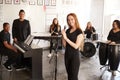 Portrait Of Students At Performing Arts School Playing In Band At Rehearsal With Teacher Royalty Free Stock Photo