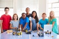 Portrait Of Students With Teacher Building Robot Vehicle In After School Computer Coding Class Royalty Free Stock Photo