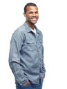 Portrait, studio and black man with denim shirt, happy and smile on face for clothes. African male person, joy and style Royalty Free Stock Photo