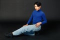 Portrait studio closeup full body shot of Asian young sexy luxury glamour slim fashionable LGBTQ gay male model in turtleneck long Royalty Free Stock Photo