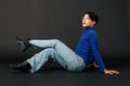 Portrait studio closeup full body shot of Asian young sexy luxury glamour slim fashionable LGBTQ gay male model in turtleneck long Royalty Free Stock Photo