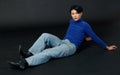 Portrait studio closeup full body shot of Asian young sexy luxury glamour slim fashionable LGBTQ gay male model in turtleneck long Royalty Free Stock Photo