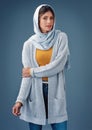 Portrait, studio and fashion with arab woman, clothes for Ramadan with modesty for religion and faith. Eco friendly