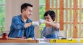 Portrait studio shot of Asian professional carpenter engineer architect woodworker dad in jeans outfit with safety goggles gloves Royalty Free Stock Photo