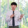 Portrait studio shot of Asian professional successful male businessman employee in formal shirt with necktie standing look at Royalty Free Stock Photo