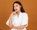 Portrait studio shot of millennial young Asian short black hair female model in white shower rope standing and posing pose in Royalty Free Stock Photo