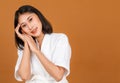 Portrait studio shot of millennial young Asian short black hair female model in white shower rope standing smiling look at camera Royalty Free Stock Photo