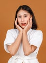 Portrait studio shot of millennial young Asian short black hair female model in white shower rope standing smiling look at camera Royalty Free Stock Photo