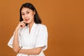 Portrait studio shot of millennial young Asian short black hair female model in white shower rope standing smiling look at camera Royalty Free Stock Photo