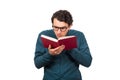 Portrait of stupefied nerd student guy, or professor wears eyeglasses, looking bewildered, double checking information from the Royalty Free Stock Photo