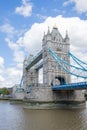 The Iconic Tower Bridge Over the River Thames and Under a Cloudy Blue Sky Royalty Free Stock Photo