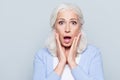 Portrait of stylish, aged, charming, surprised, shocked woman ho Royalty Free Stock Photo