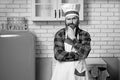 Portrait of stylish bearded cook on a kitchen. Royalty Free Stock Photo