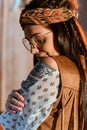 Portrait of stylish bohemian girl in headband