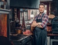 Portrait of stylish cook on a kitchen. Royalty Free Stock Photo