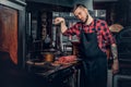 Portrait of stylish cook on a kitchen. Royalty Free Stock Photo