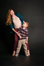 Portrait of stylish cute little boy with beautiful mom Royalty Free Stock Photo