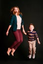 Portrait of stylish cute little boy with beautiful mom Royalty Free Stock Photo