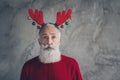 Portrait of stylish funny old man in deer headband enjoy christmas party masquerade wear modern pullover isolated over