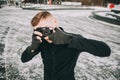 Portrait of stylish handsome man with camera Royalty Free Stock Photo