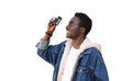 Portrait of stylish happy smiling african man photographer with film camera taking picture isolated on white background