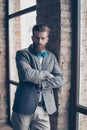 Portrait of stylish hipster minded brutal young man with bow-tie, red mustache, heavy thick beard and beautiful Royalty Free Stock Photo