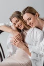 portrait of stylish loving sisters hugging Royalty Free Stock Photo